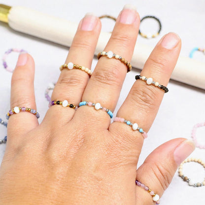 SHELLIGHT BLACK | Zwarte kwarts, howliet & schelp ring | Goudkleurig | One size