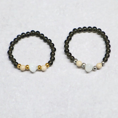 SHELLIGHT BLACK | Zwarte kwarts, howliet & schelp ring | Goudkleurig | One size