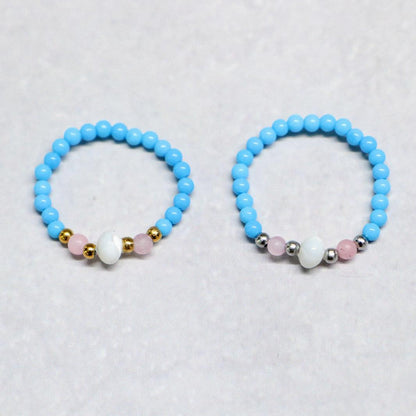 SHELLLIGHT TURQUOISE | Howliet, rozenkwarts & schelp ring | Goudkleurig | One size